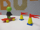 ( A10/7 ) Lego Fabuland Set Clive Crocodile Red Bow Tie on Skateboard ( 3721 )